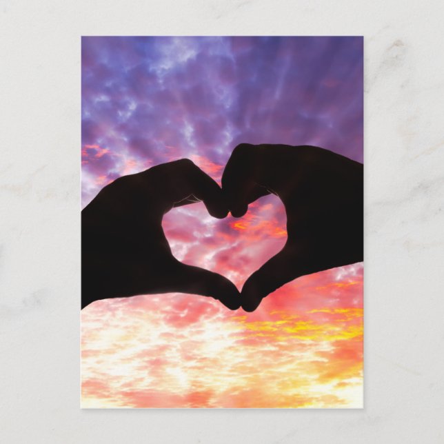 Silhouette hand in heart shape and beautiful sky postcard (Front)