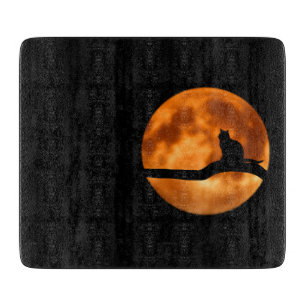 Silhouette of a Black Cat in a Tree Cutting Board