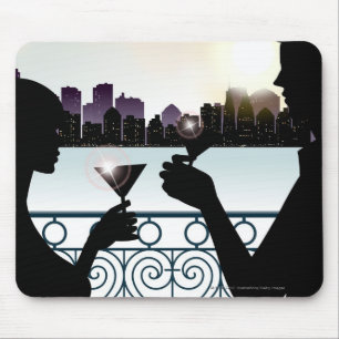 Silhouette of a couple toasting martini glasses mouse pad