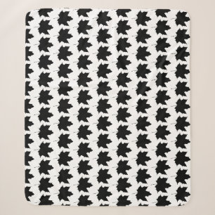 Silhouette of a maple leaf sherpa blanket
