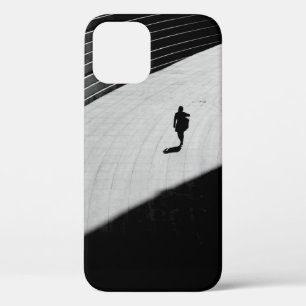 SILHOUETTE OF A PERSON WALKING ON GRAY CONCRETE FL iPhone 12 CASE