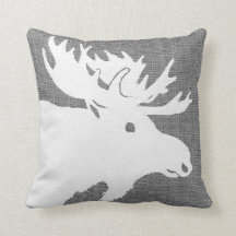 Silhouette of a white moose on a soft grey bckgrnd
