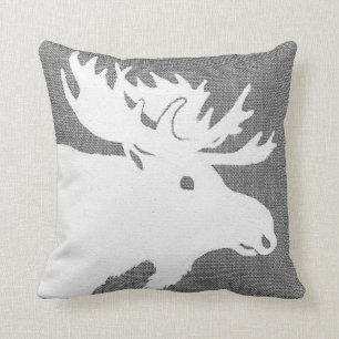 Silhouette of a white moose on a soft grey bckgrnd cushion
