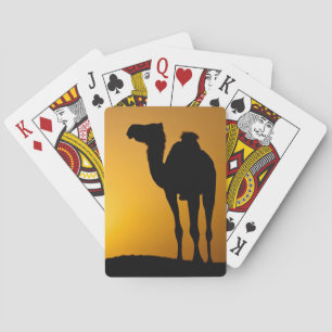 Silhouette of a wild camel at sunset playing cards