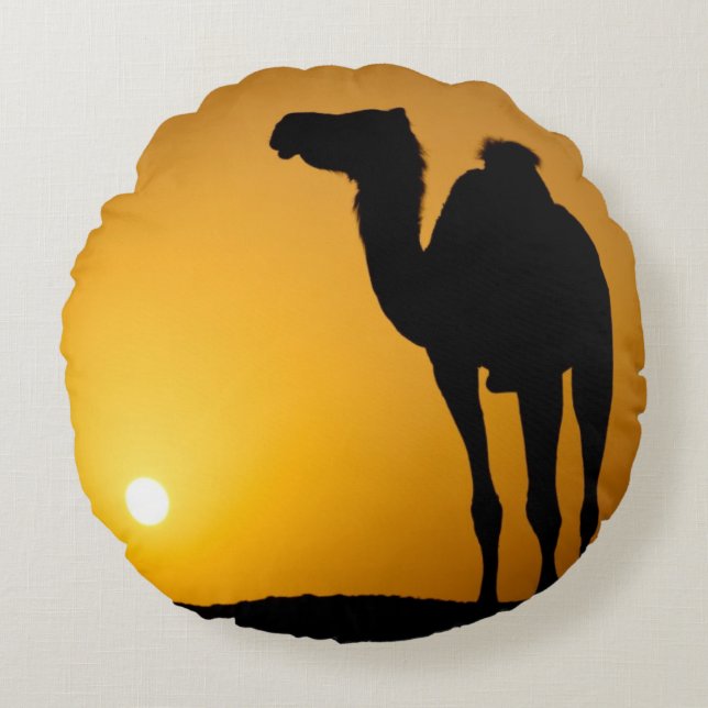 Silhouette of a wild camel at sunset round cushion (Front)
