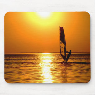 Silhouette of a windsurfer mouse pad