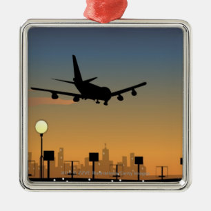 Silhouette of an aeroplane in flight metal ornament