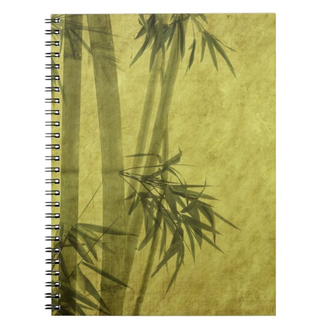 Silhouette of branches of a bamboo on paper notebook (Front)