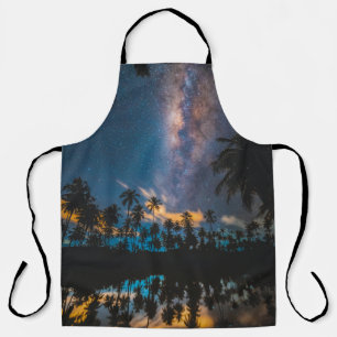 Silhouette of coconut trees reflected on body of w apron