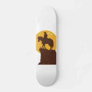 Silhouette of cowboy riding horse at sunset skateboard