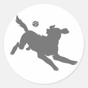 Silhouette of dog with ball classic round sticker