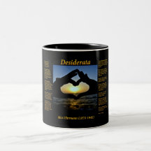 Silhouette of hands making a heart in yellow