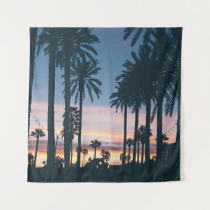 Silhouette of houses beside palm trees and pathway tapestry