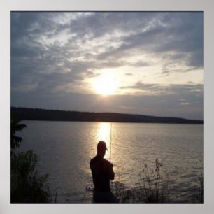 Silhouette of man fishing at sunset poster