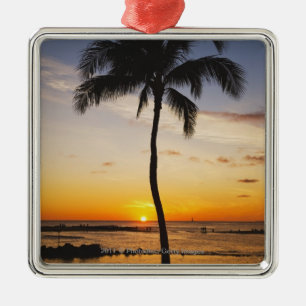 Silhouette of one Palm Tree by a Red Orange Sunset Metal Ornament