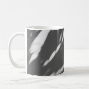 Silhouette of palm tree coffee mug