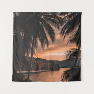 Silhouette of palm tree during golden hour tapestry