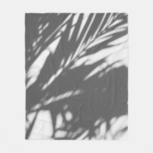 Silhouette of palm tree fleece blanket