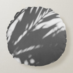 Silhouette of palm tree round cushion