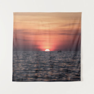 SILHOUETTE OF PERSON ON BODY OF WATER DURING SUNSE TAPESTRY