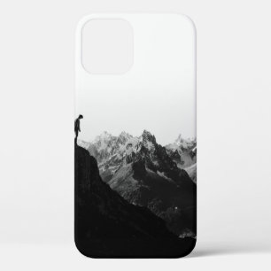 SILHOUETTE OF PERSON STANDING ON CLIFF IN FRONT OF iPhone 12 CASE