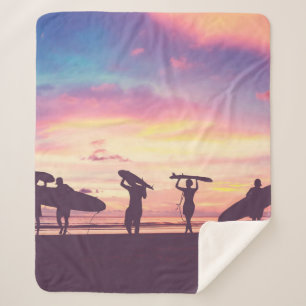 Silhouette Of surfer people carrying their surfboa Sherpa Blanket