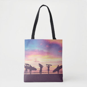 Silhouette Of surfer people carrying their surfboa Tote Bag