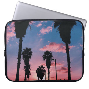 Silhouette of tree under cloudy sky laptop sleeve