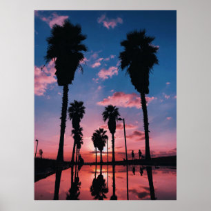 Silhouette of tree under cloudy sky poster