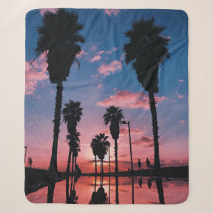 Silhouette of tree under cloudy sky sherpa blanket