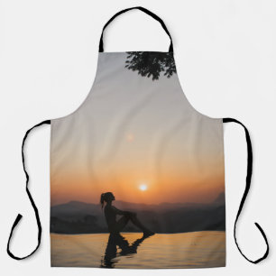 Silhouette of woman sitting on edge of eternity po apron