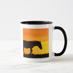 Silhouette of zebra on savanna mug
