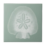 Silhouette Sand Dollar Ceramic Tile<br><div class="desc">Can you imagine living your life on the beach? Get this beautiful image of this silhouette sand dollar to add to your beach collection. This unique translucent piece of art work is great on any of your Zazzle products. It's contemporary and modern art will make you the most stylish among...</div>