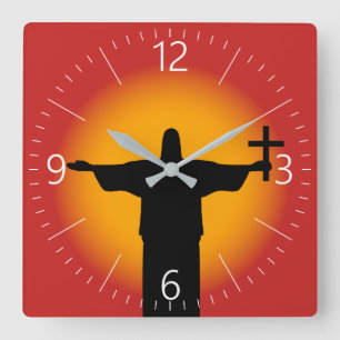 Silhouette with a cross square wall clock