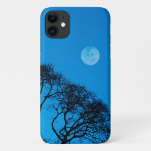 Silhouetted trees and full moon iPhone 11 case