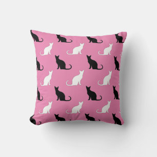 Silhouettes Of Black and White Cats On Pink Cushion