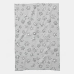 Silver 3-d snowflakes on a silver background tea towel