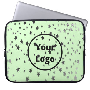 Silver and black stars on green laptop sleeve