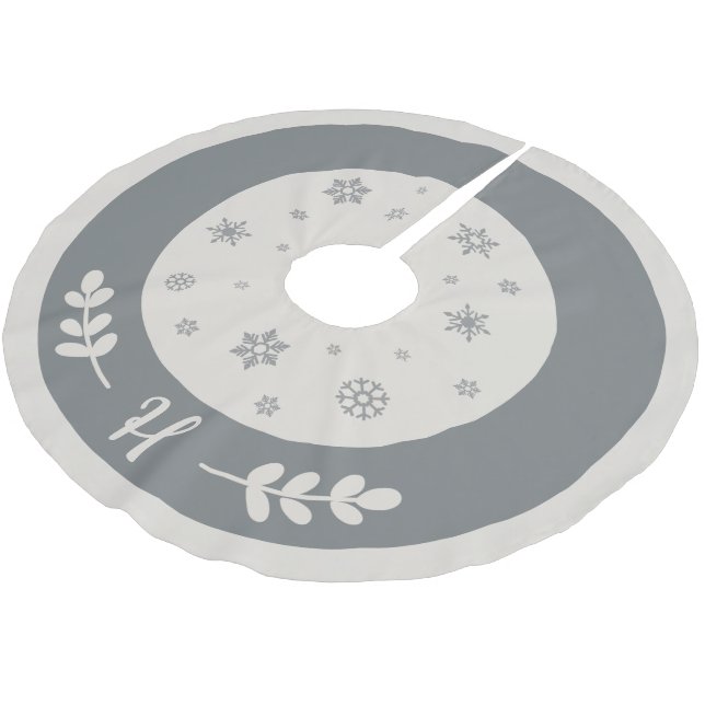 Silver and white with snowflakes and monogram brushed polyester tree skirt (Angled)