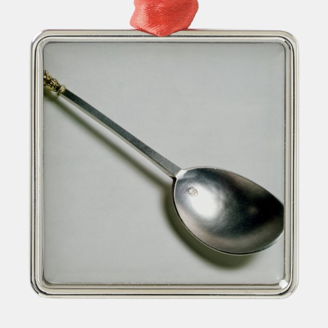 Silver apostle spoon with gold seal top, 1668 metal ornament (Front)
