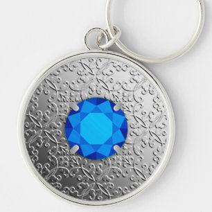 Silver Damask with a faux sapphire gemstone Key Ring