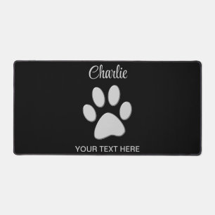 Silver Dog Paw on black background Desk Mat