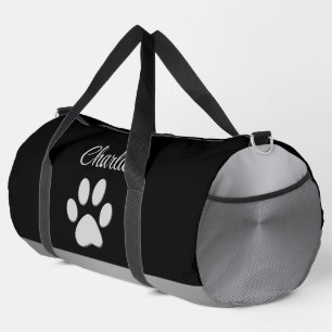 Silver Dog Paw on black background Duffle Bag