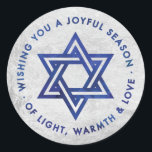 Silver Foil Hanukkah Greeting Sticker<br><div class="desc">Sticker with a silver foil effect backgroung,  with the Star of David and the Hanukkah greeting,  "Wishing you a joyful season of light,  warmth and love" in a dark blue watercolor effect. Perfect for using as favour stickers on gelt bags.</div>