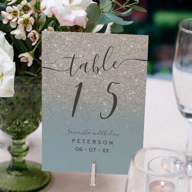 Silver glitter dusty blue script wedding table table number (Creator Uploaded)