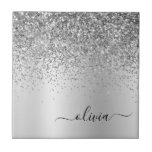 Silver Glitter Metal Monogram Glam Name Ceramic Tile<br><div class="desc">Silver Faux Foil Metallic Sparkle Glitter Brushed Metal Monogram Name and Initial Ceramic Tiles. This makes the perfect sweet 16 birthday,  wedding,  bridal shower,  anniversary,  baby shower or bachelorette party gift for someone that loves glam luxury and chic styles.</div>