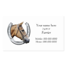 Silver horseshoe with a horse's head inside