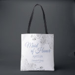 Silver Lace Dusty Blue Maid of Honour White Weddin Tote Bag<br><div class="desc">This beautiful tote bag is designed as a gift, favour, or swag bag for your wedding Maid of Honour. The simple yet elegant design features ornate silver grey lace frills in the corners with fancy dusty blue script lettering. There is space for her name, as well as the names of...</div>