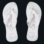 Silver Lace & Dusty Rose Script The Bride Wedding Thongs<br><div class="desc">Dance the night away with these beautiful wedding flip flops. Designed for the bride, they feature a simple yet elegant design with dusty rose or mauve pink script lettering on a white background and fancy silver grey lace curls and swirls. Beautiful way to stay fancy and appropriate while giving your...</div>
