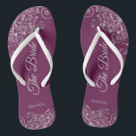 Silver Lace on Cassis Purple The Bride Wedding Thongs<br><div class="desc">Dance the night away with these beautiful wedding flip flops. Designed for the bride, they feature a simple yet elegant design with pale gray script lettering on a cassis purple, magenta, or berry colored background and fancy silver gray lace curls and swirls. Beautiful way to stay fancy and appropriate while...</div>